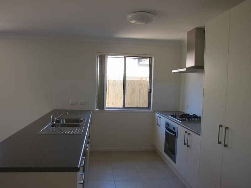 26 Hallvard Crescent, AUGUSTINE HEIGHTS, QLD 4300
