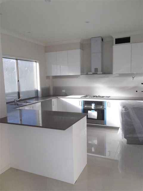 1/2  Compass Drive, BIGGERA WATERS, QLD 4216
