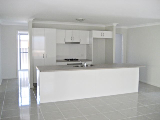 7 Clarkstone Avenue, Cameron Park, NSW 2285