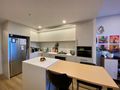 STYLISH APARTMENT WITH HIGH CEILINGS & GARAGE DIRECTLY BENEATH IN THORNTON ESTATE! - Penrith