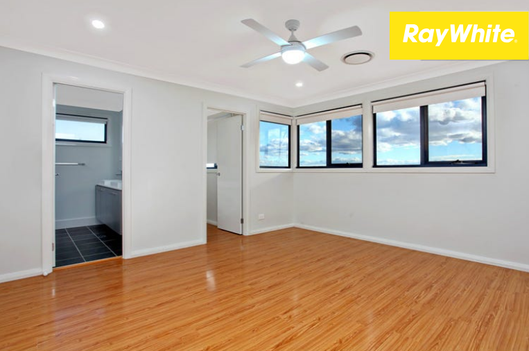 Sun Drenched Family Home Within Waking Distance to Schofields Village and Train Station! — photo 4 of 5