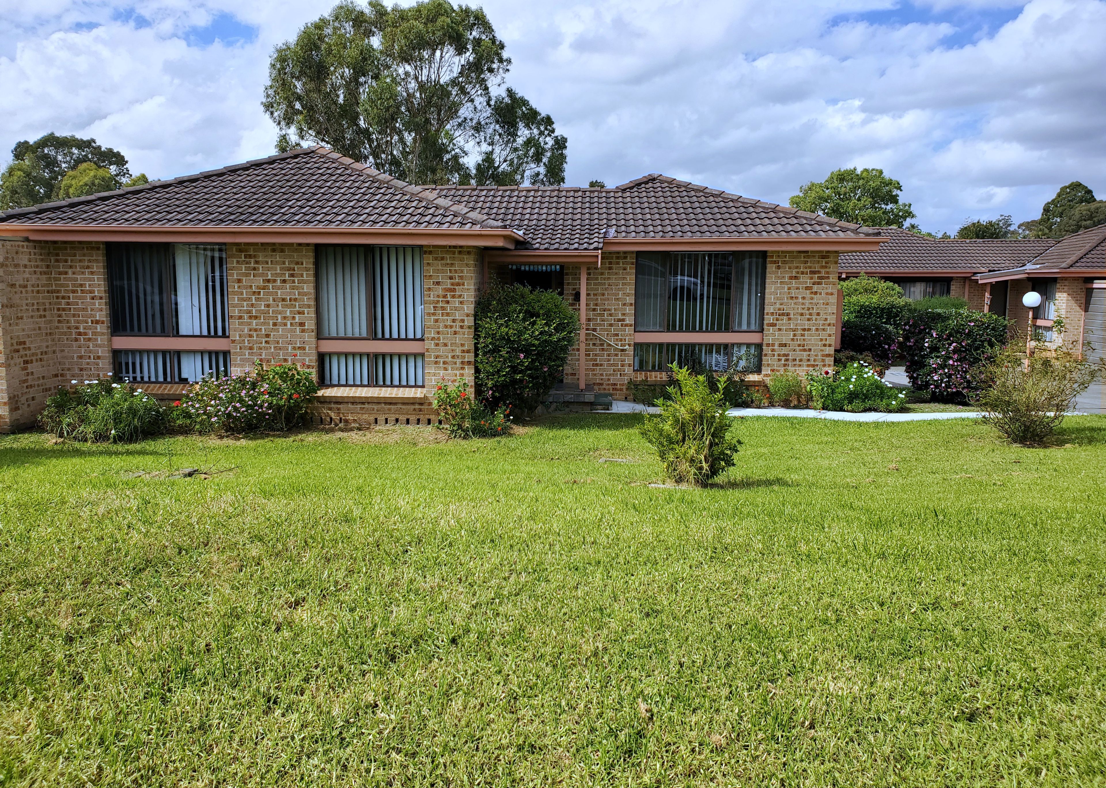 65 Fuchsia Crescent, Macquarie Fields NSW 2564