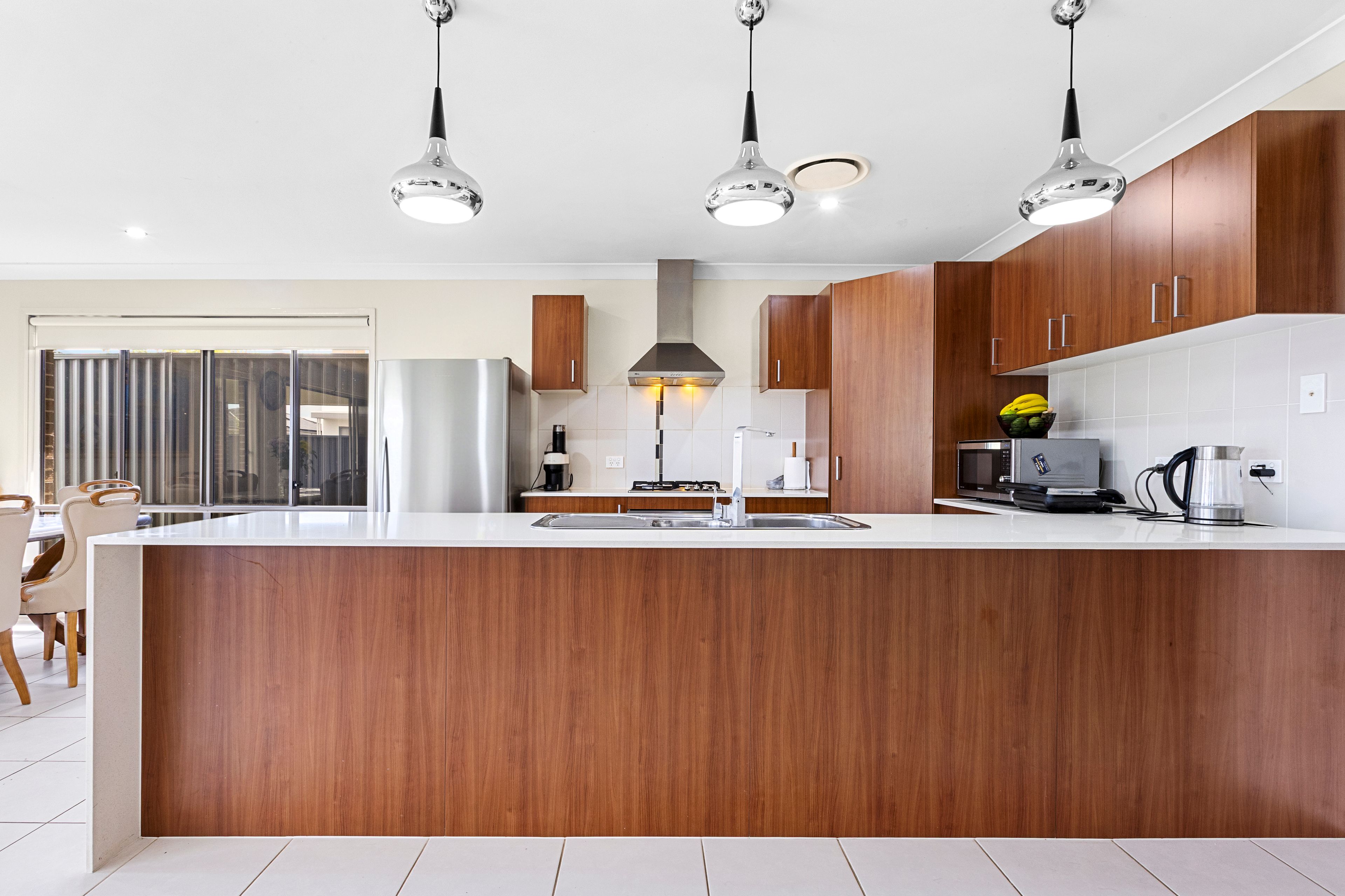Contemporary Family Living with a Desirable North-East Aspect | 5 Minute Walk to Schofields Public School! — photo 3 of 12