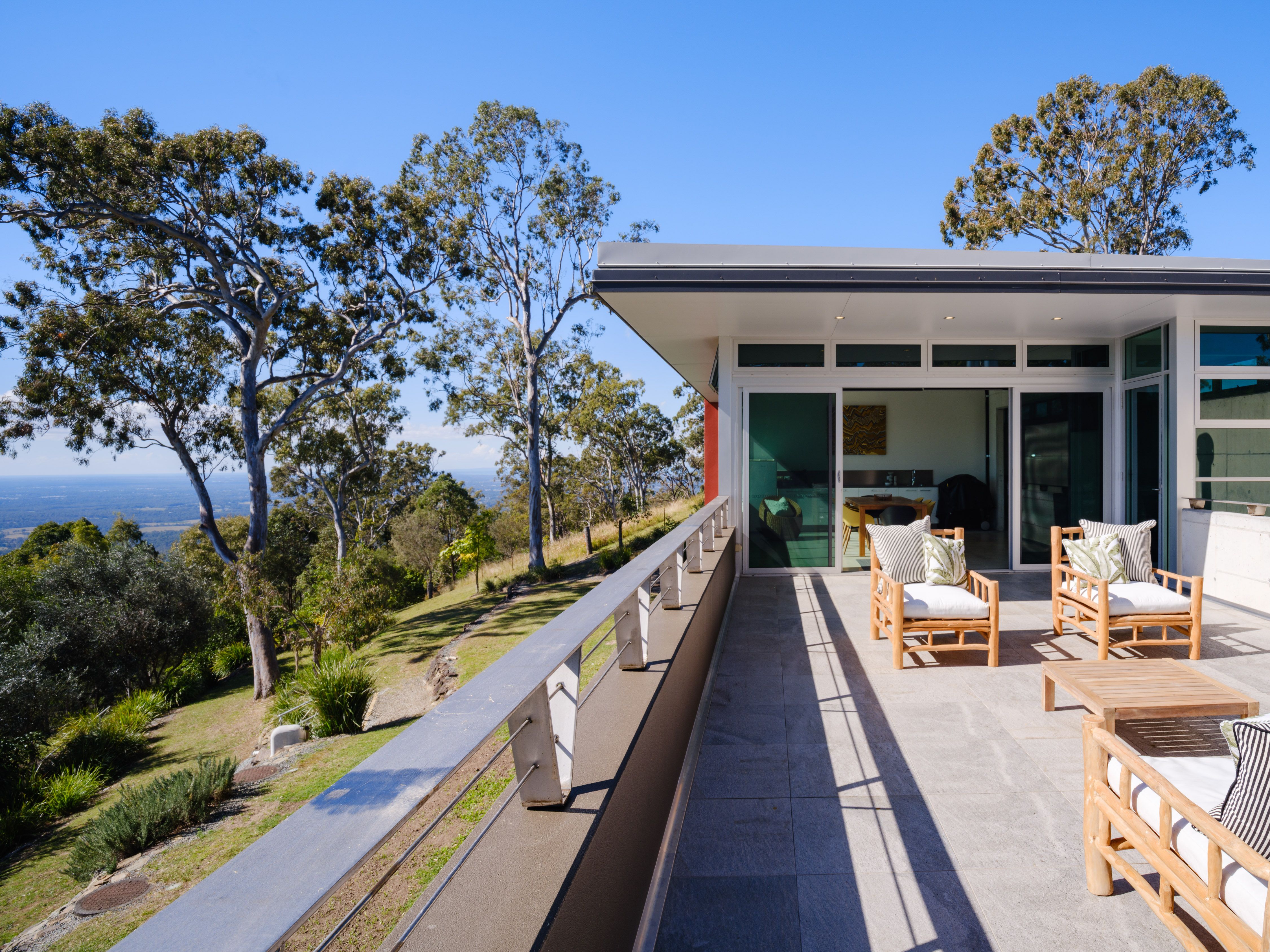 Architectural Masterpiece with Panoramic Glasshouse Mountain Views — photo 11 of 28