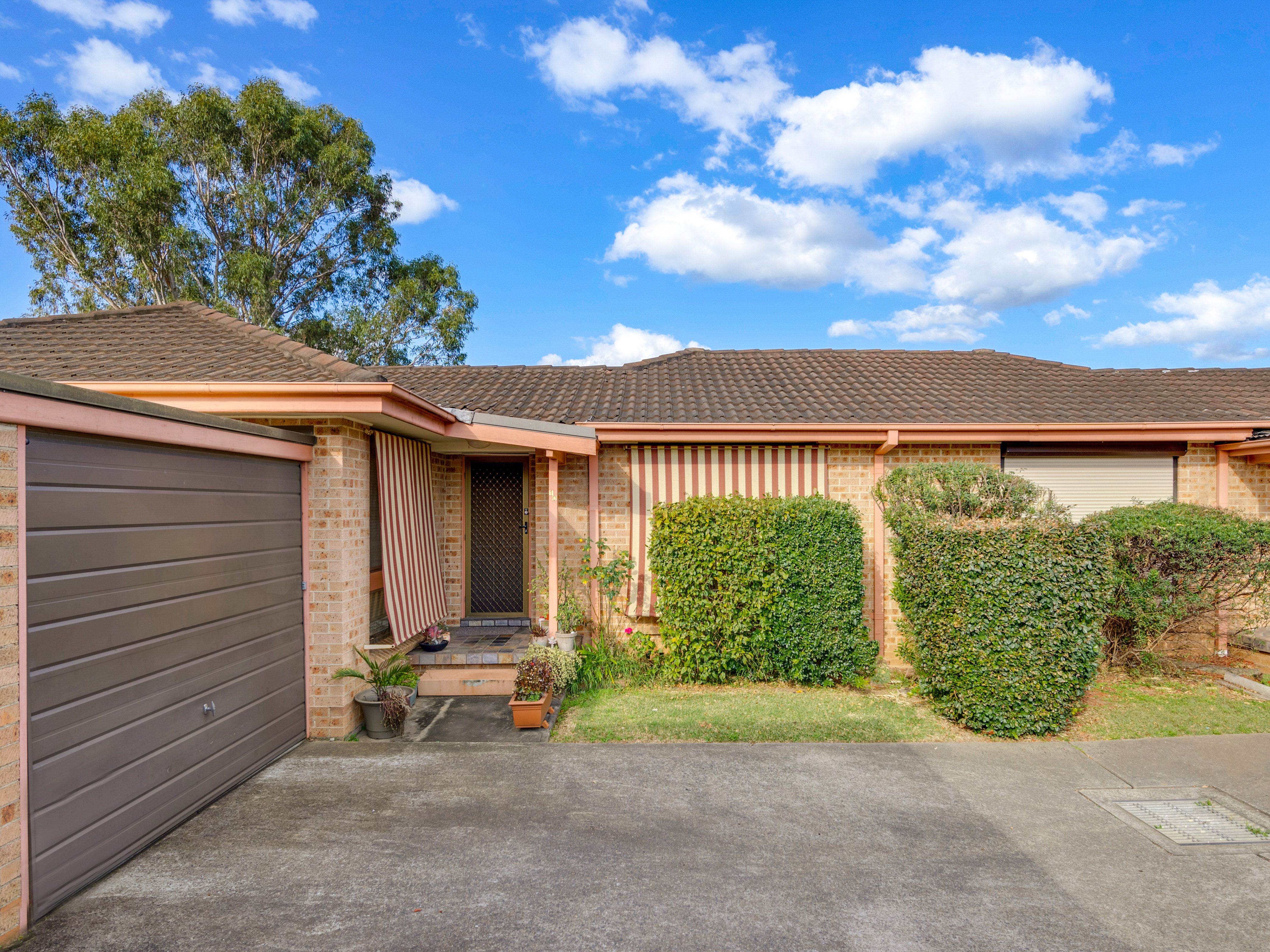 65 Fuchsia Crescent, Macquarie Fields NSW 2564