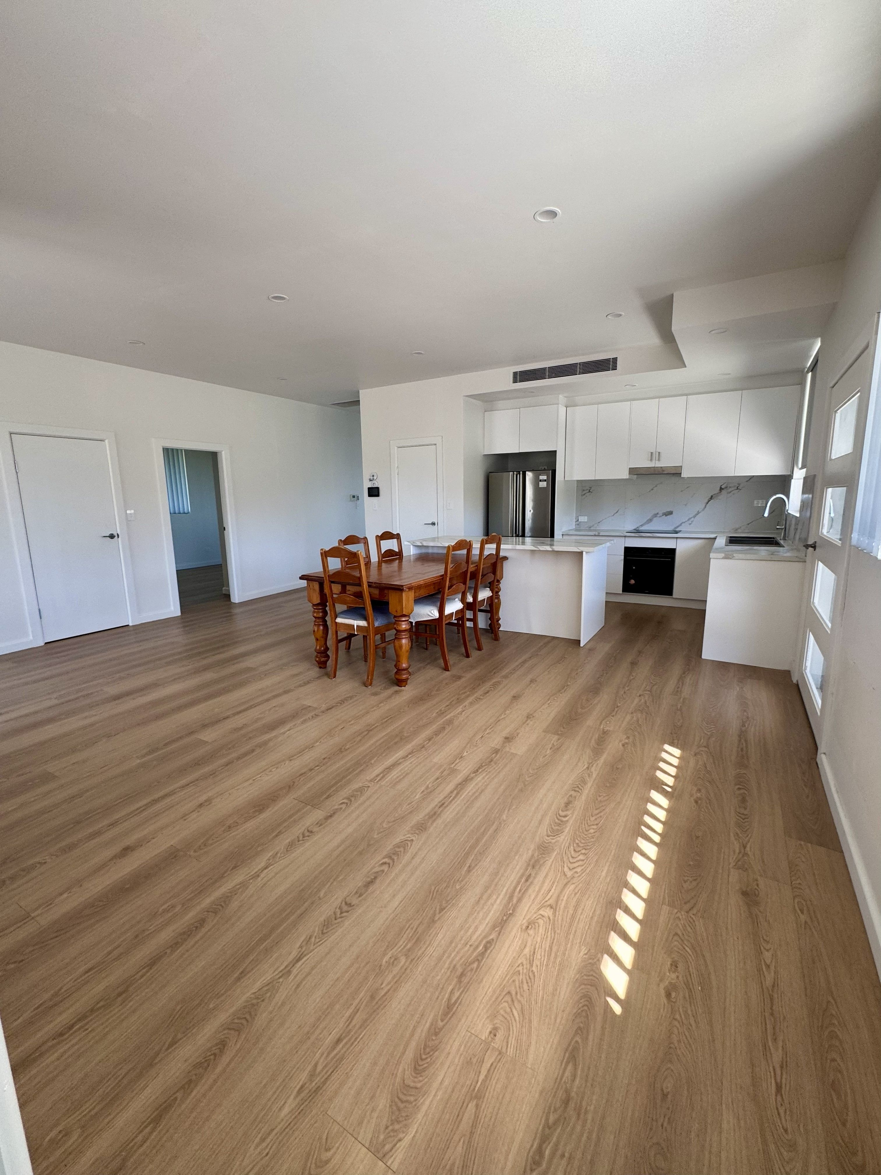 Brand New Luxury Living with Stunning Plains Views — photo 3 of 11