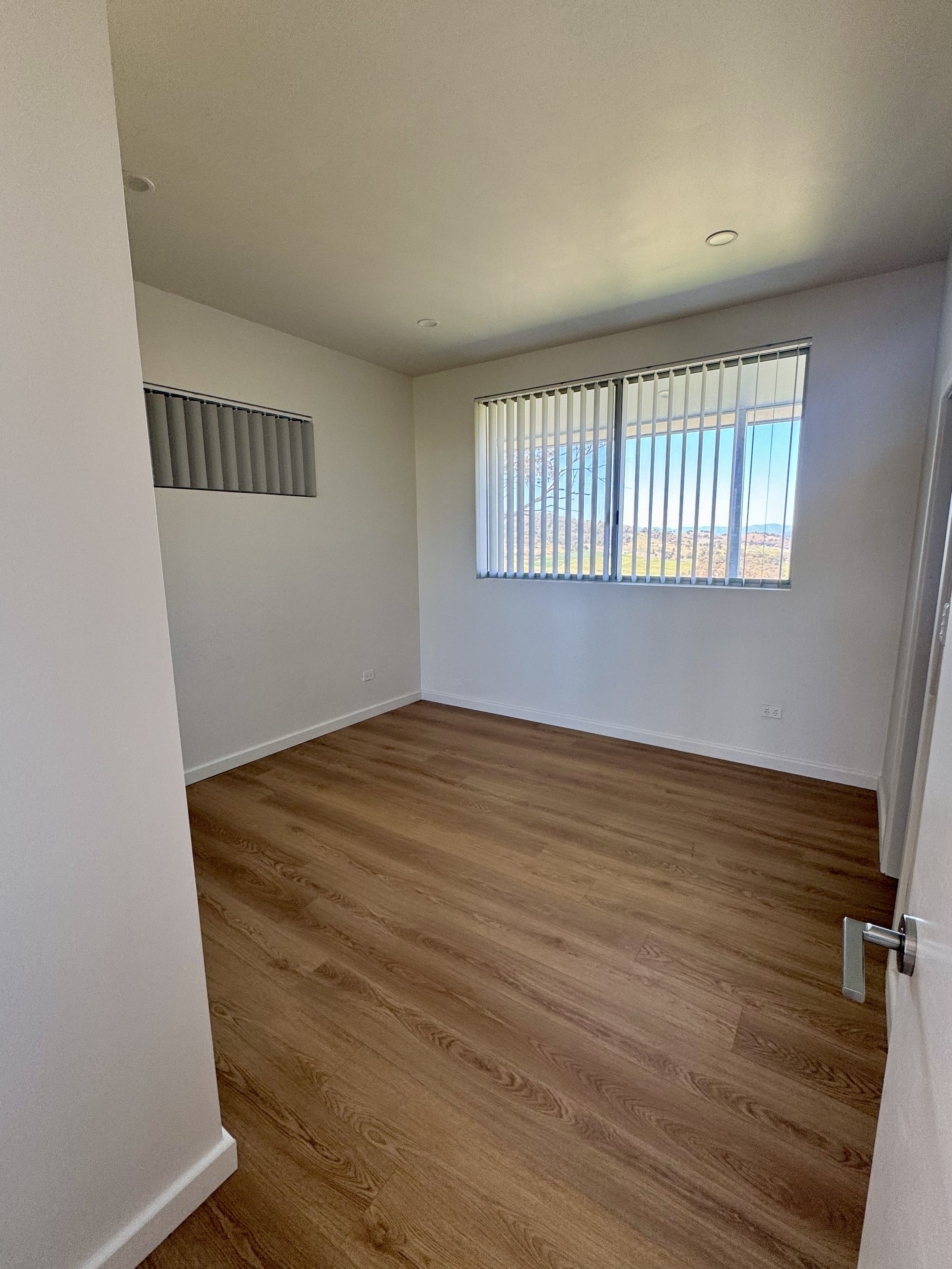Brand New Luxury Living with Stunning Plains Views — photo 8 of 11