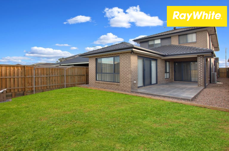 Sun Drenched Family Home Within Waking Distance to Schofields Village and Train Station! — photo 5 of 5