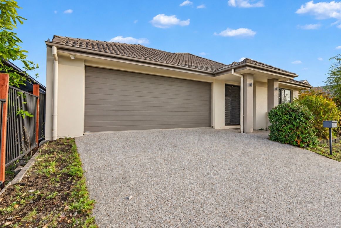 67 Burnett Drive — photo from Ray White Springwood QLD