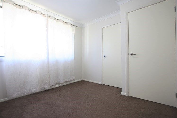 34 Rosewood Drive, Macquarie Fields, NSW 2564